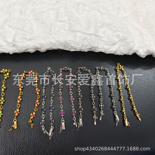 A simple and individual antique golden cross-flower diamond-encrusted thin bracelet for a couple